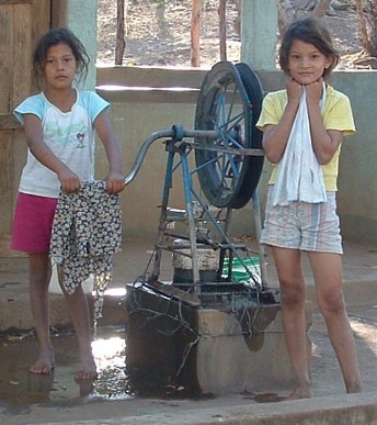 Girls Pumping Water